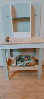 Speelgoed werkbank, Ophalen