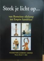 Steek je licht op... Van Romeinse olielamp tot Empire kandel, Ophalen of Verzenden