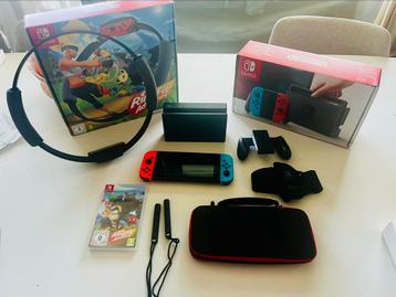 Nintendo Switch+ RingFit Adventure + hoesje – in prima staat beschikbaar voor biedingen