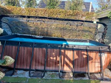 Perfect onderhouden EXIT Wood zwembad 400x200x100 beschikbaar voor biedingen