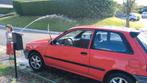 Toyota Starlet oldtimer/voorouder 1990, Auto's, Starlet, Grijs, 3 deurs, Rood