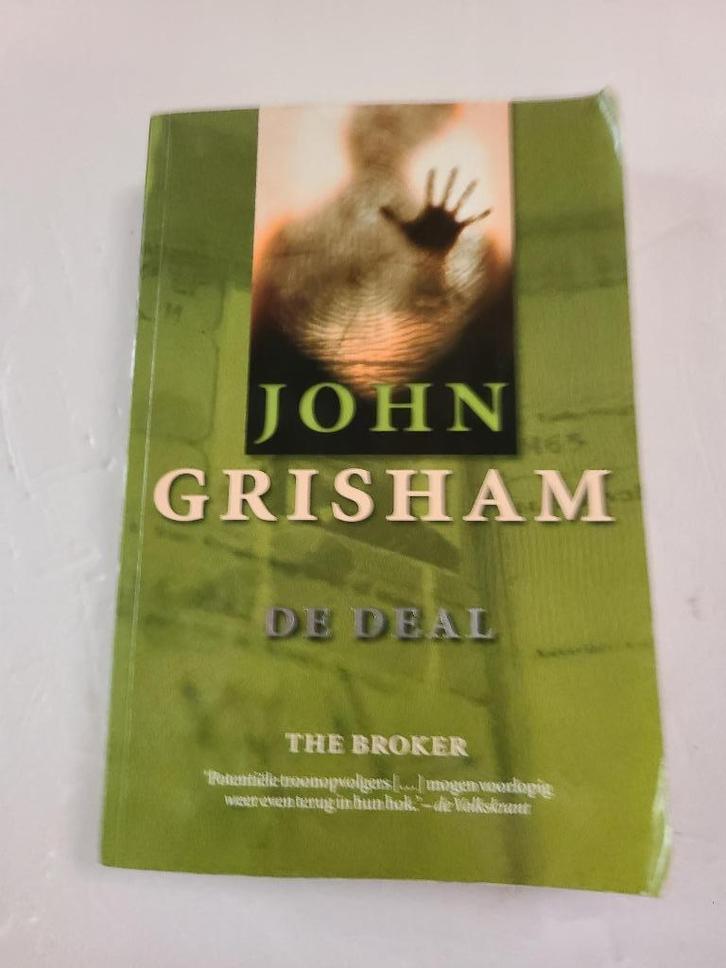 boek de deal John Grisham, Boeken, Thrillers, Zo goed als nieuw, Ophalen of Verzenden