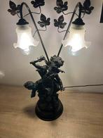 Zwaar beeld met lamp, Ophalen