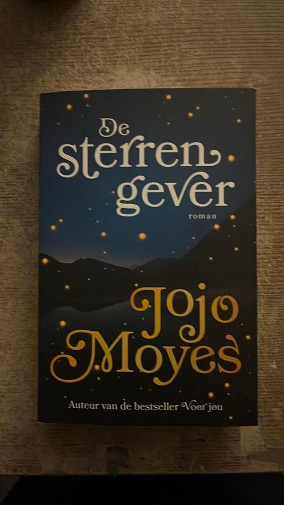 Jojo Moyes - De sterrengever, Boeken, Literatuur, Zo goed als nieuw, Ophalen of Verzenden