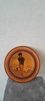 Houten bord, Ophalen