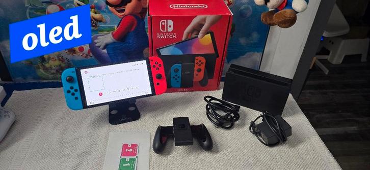 Nintendo Switch OLED-console: C.Nieuw en compleet +garantie, Games en Spelcomputers, Games | Nintendo Switch, Zo goed als nieuw