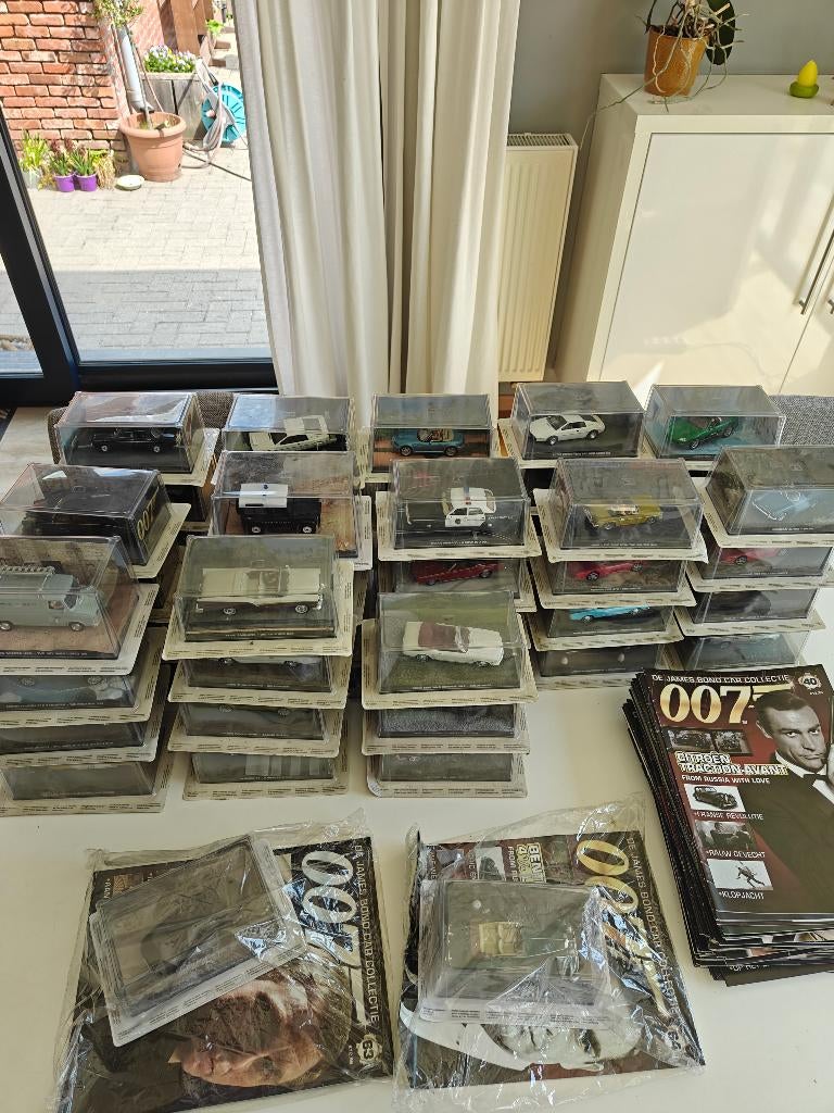 Uniek: James Bond 007 auto collectie (54 stuk) met magazines, Collections, Cinéma & Télévision, Neuf, Enlèvement