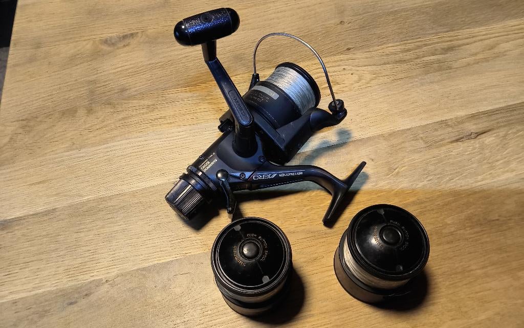 Shimano Aero 6010 baitrunner., Enlèvement ou Envoi, Comme neuf, Moulinet