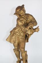 Meneer met gebonden handen — Vergulde sculptuur van een lini, Antiek en Kunst, Ophalen of Verzenden, Koper