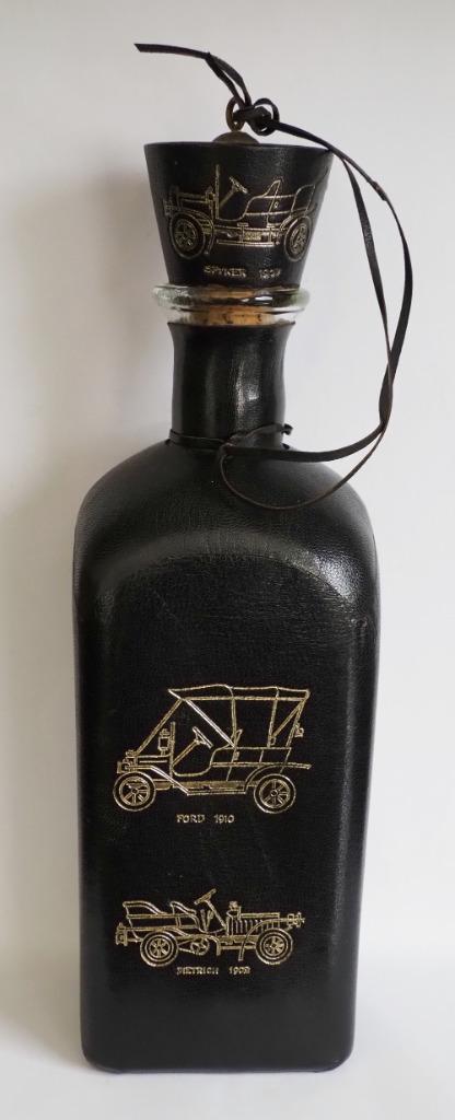 Glazen fles van Mallorca bekleed met zwart leer, Antiek en Kunst, Antiek | Glaswerk en Kristal, Ophalen of Verzenden