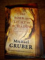Michael Gruber - Boek van licht en schaduw, Ophalen of Verzenden, Zo goed als nieuw, Michael Gruber