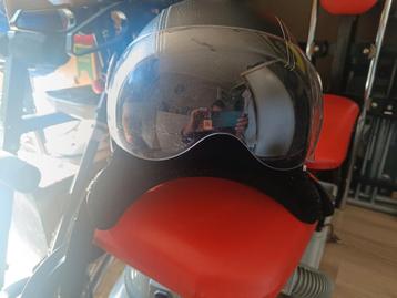 Scooter helm in proper staat en perfect  beschikbaar voor biedingen