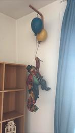 Clown met ballonnen, Ophalen