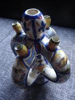 Vase pique fleurs, Ophalen