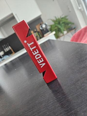 VEDETT BOTTLE OPENER beschikbaar voor biedingen