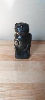 Statuette africaine en bois dur, Enlèvement