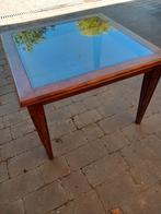 Tafel met getint glas, Ophalen