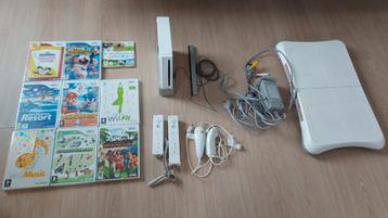 Wii console + balance board + 9 spelletjes beschikbaar voor biedingen