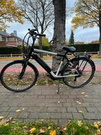 Elektrische heren fiets krigori, Ophalen, Zo goed als nieuw
