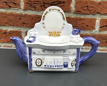 Theepot in vorm lavabo beschikbaar voor biedingen