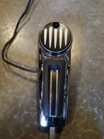 Chrome dash van een harley touring, Ophalen