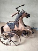 Antieke houten driewieler paard, Ophalen