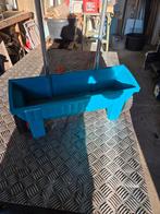 Meststof strooier-graszaaier, Ophalen