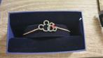 Bracelet Swarovski Mickey et Minnie plaqué or rose neuf, Ophalen, Nieuw, Goud, Goud