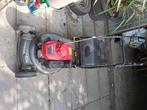 Grasmaaier met rol, Ophalen