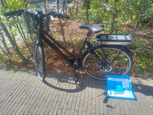 Koga E-Xtension 2015 - opgelet: kapotte acculader, Fietsen en Brommers, Elektrische fietsen, Gebruikt, Overige merken, 55 tot 59 cm