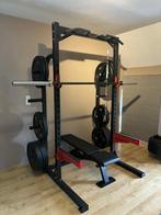 Pivot Fitness rack + bumper plates (150kg) + barbell, Sport en Fitness, Benen, Krachtstation, Ophalen of Verzenden, Zo goed als nieuw
