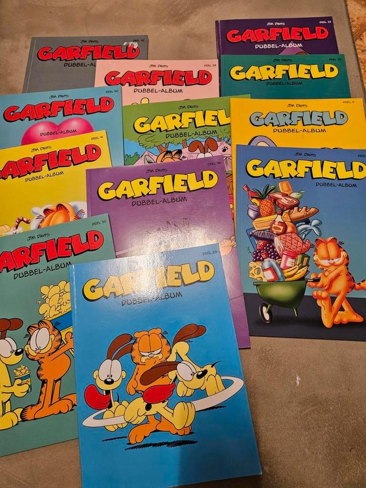 12 dubbel albums garfield nieuw staat, Boeken, Stripverhalen, Zo goed als nieuw, Ophalen of Verzenden