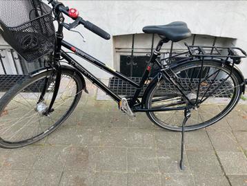 Vélo de ville robuste disponible aux enchères