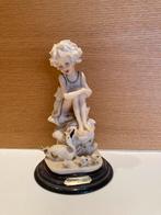 Porselein beeldje van escarpiao de ouro, Ophalen, Zo goed als nieuw