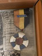 Cadre avec photo de groupe avec médaille belge, Enlèvement