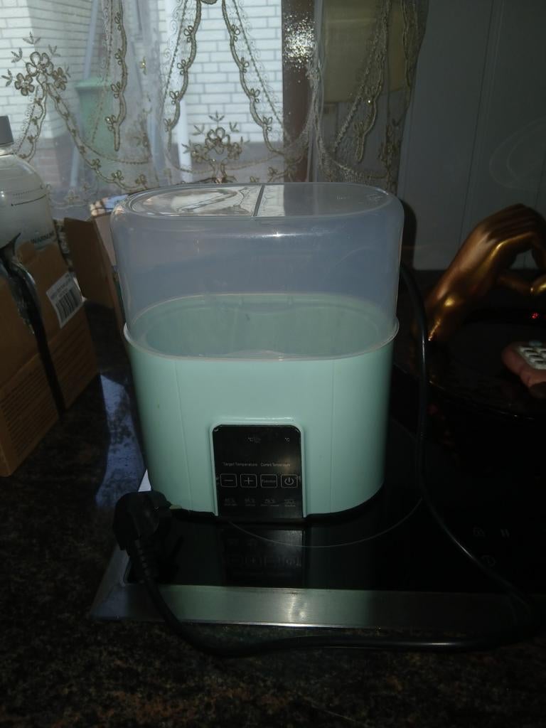 Flesverwarmer, Ophalen