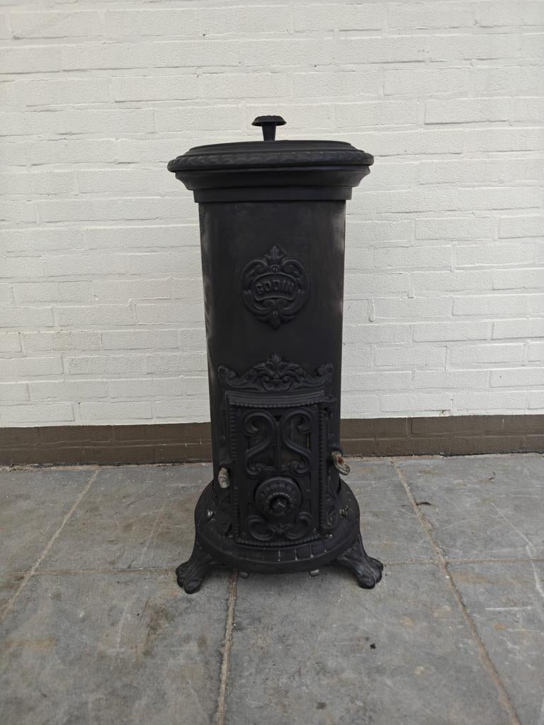 Godin hout en kolenkachel, Enlèvement