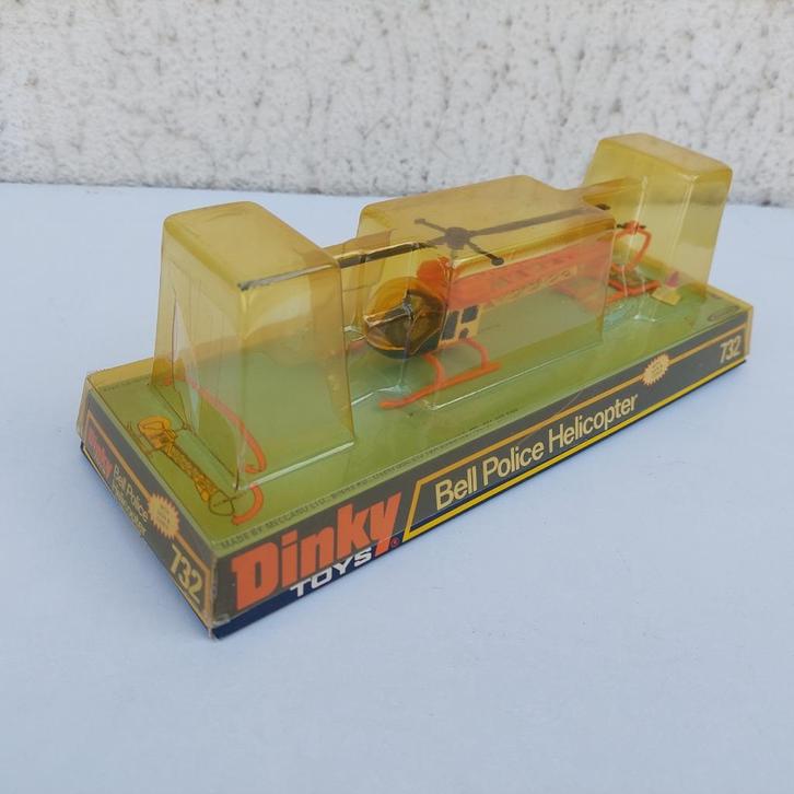 DINKY TOYS 732 BELL POLITIEHELIKOPTERONDERSTEUNING BLISTERSI, Hobby en Vrije tijd, Modelbouw | Vliegtuigen en Helikopters, Gebruikt