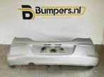 Bumper Opel Corsa D 332550271 Achterbumper 1-E10-13162, Auto-onderdelen, Gebruikt, 6 maanden garantie, Ophalen of Verzenden, Achter