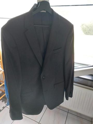 Mannenpak donkerblauw maat 50 beschikbaar voor biedingen