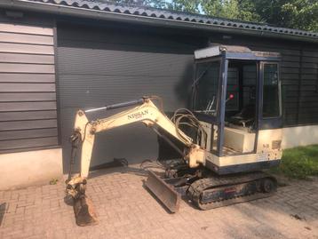 Nissan graafmachine minigraver goed werkende staat beschikbaar voor biedingen
