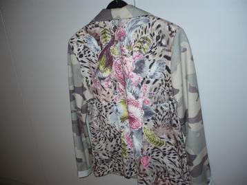 mooie damesvest met strass beschikbaar voor biedingen
