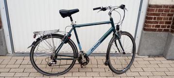 Herenfiets met zadelvering 24 versnellingen beschikbaar voor biedingen