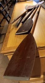 Oude houten paddels, Enlèvement