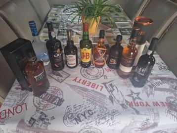 Lot de 9 bouteilles d alcool nouvel  beschikbaar voor biedingen