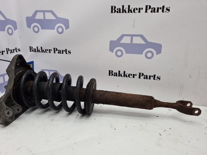 Schokdemperpoot links-voor van een Volkswagen Passat, Auto-onderdelen, Ophanging en Onderstel, Volkswagen, Gebruikt, 3 maanden garantie