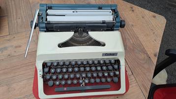 Oud typemachine Erika met handleiding, Enlèvement