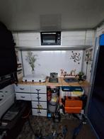 Heel mooie en grote aanhangwagen, Ophalen