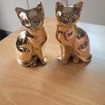2 koperen poezen, Ophalen