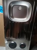 Evier et plaques électriques, Enlèvement